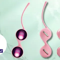 Różowe kulki gejszy na marmurowym tle. Obok symbol dłoni z zaznaczeniem "OK".